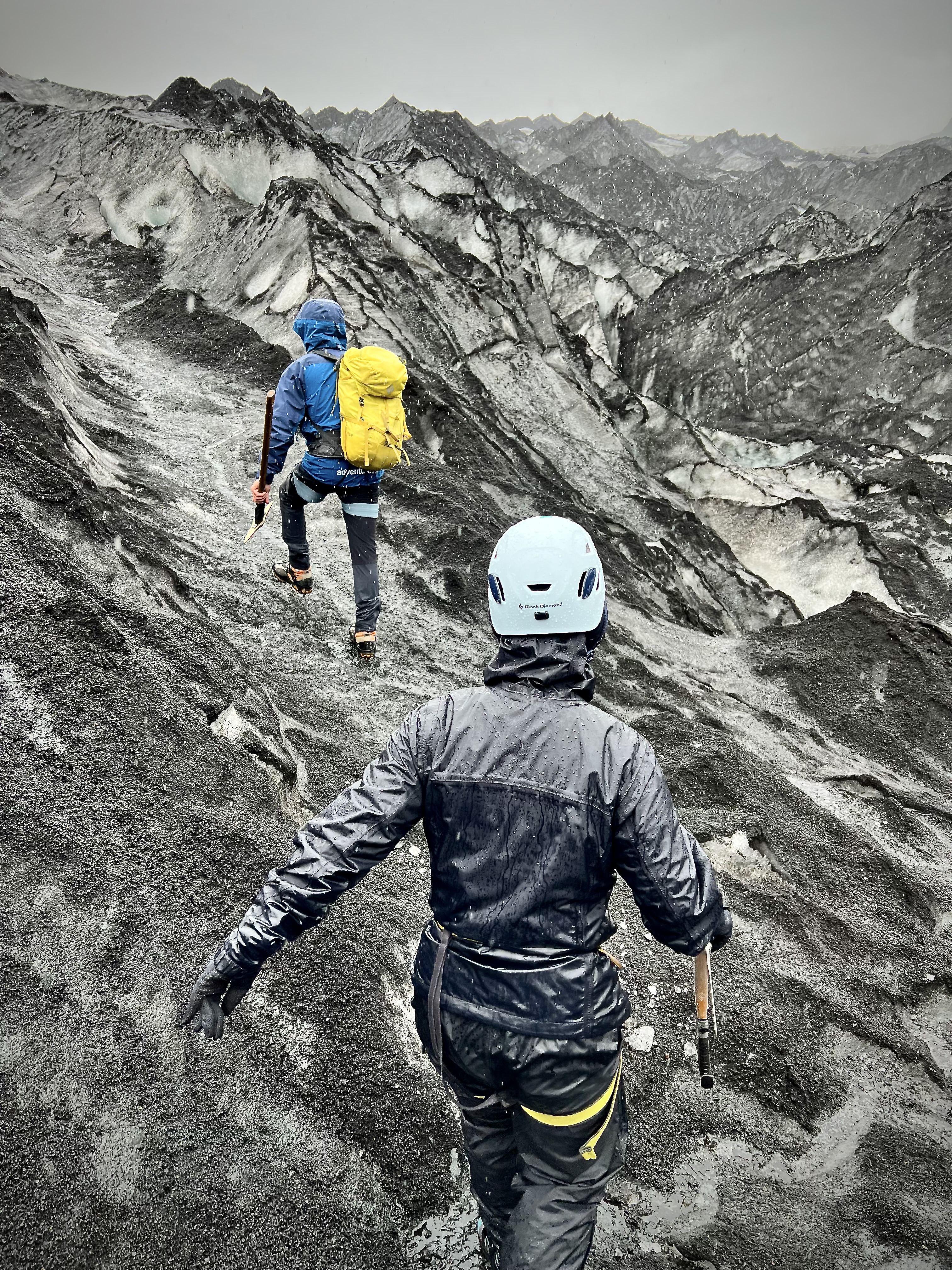 Hikers with ice climbing gear on hike in Iceland